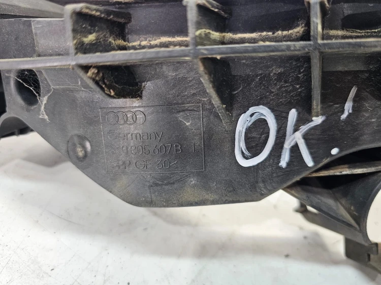 ŚLIZG REFLEKTORA LEWY AUDI A4 B8 LIFT 8K0805607B OK