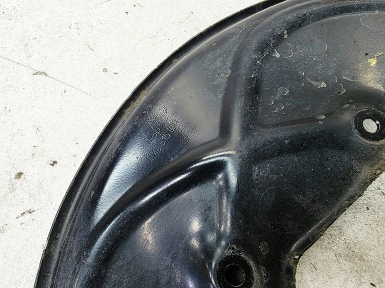 OSŁONA TARCZY HAMULCOWEJ LEWY TYŁ AUDI Q7 4M 4M0615611C