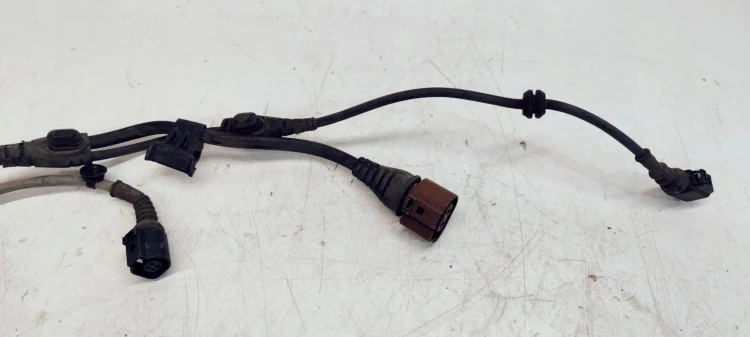 WIĄZKA ZACISKU LEWY TYŁ AUDI A6 C6 4F0972253P