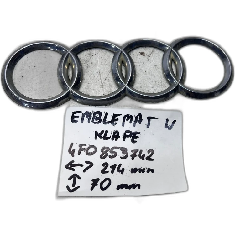ZNACZEK EMBLEMAT Z KLAPY BAGAŻNIKA AUDI A6 C6 4F0853742 214MM X 70MM