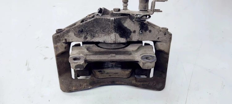 ZACISK HAMULCOWY JARZMO LEWY AUDI A6 C6 973 320MM
