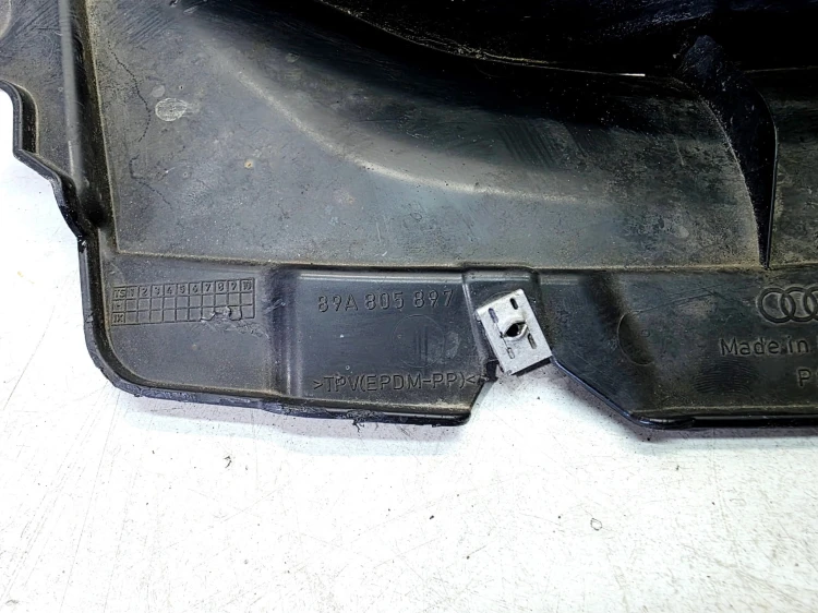 CHLAPACZ SPOJLER KOŁA LEWY PRZÓD AUDI Q4 E-TRON 89A805897