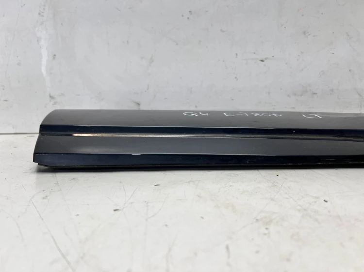 LISTWA DOLNA DRZWI LEWY TYŁ AUDI Q4 E-TRON 89A853969A