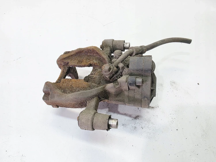 ZACISK HAMULCOWY PRAWY TYŁ AUDI A3 8V VW SEAT SKODA 5Q0615406BG