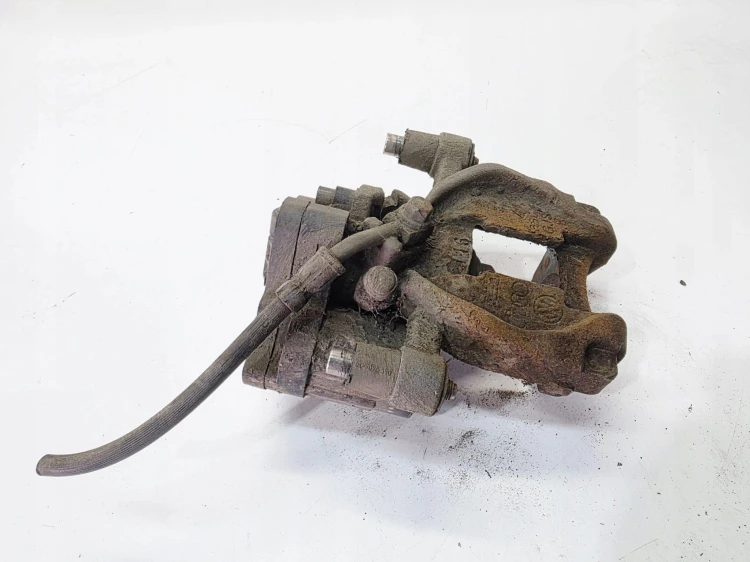 ZACISK HAMULCOWY PRAWY TYŁ AUDI A3 8V VW SEAT SKODA 5Q0615406BG