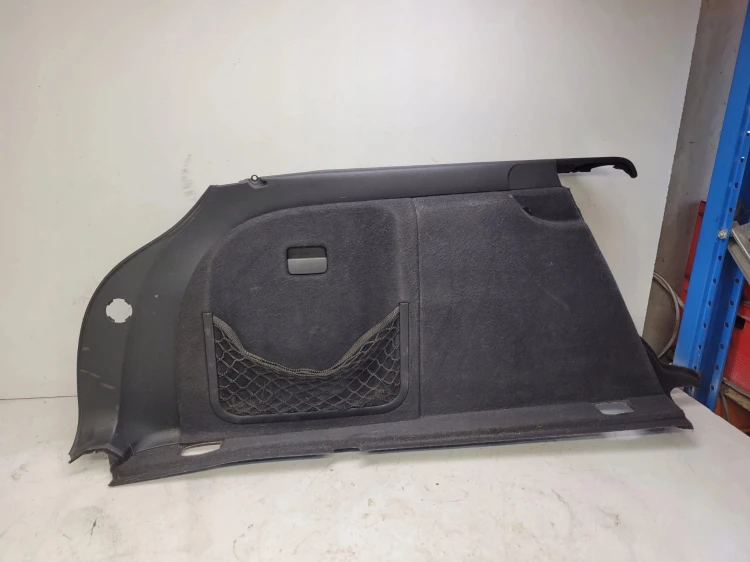BOCZEK BAGAŻNIKA LEWY AUDI A4 B7 AVANT 8E9863879M