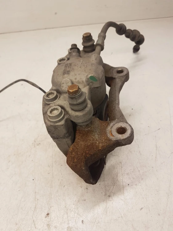 ZACISK HAMULCOWY LEWY PRZÓD AUDI A4 B8 A5 8K0105K