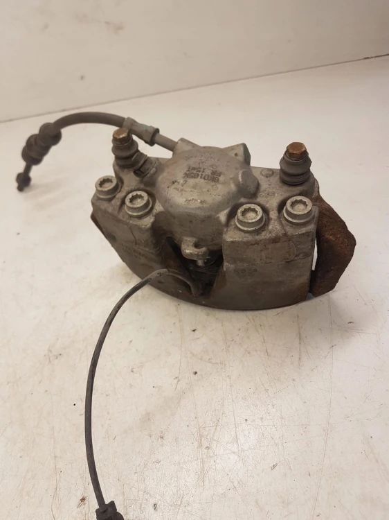 ZACISK HAMULCOWY LEWY PRZÓD AUDI A4 B8 A5 8K0105K