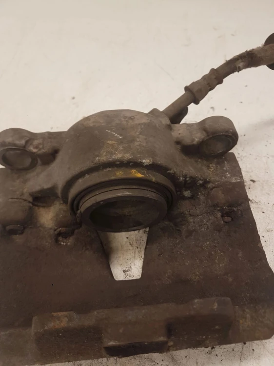 ZACISK HAMULCOWY LEWY PRZÓD AUDI A6 C7 A7 4G0105AK