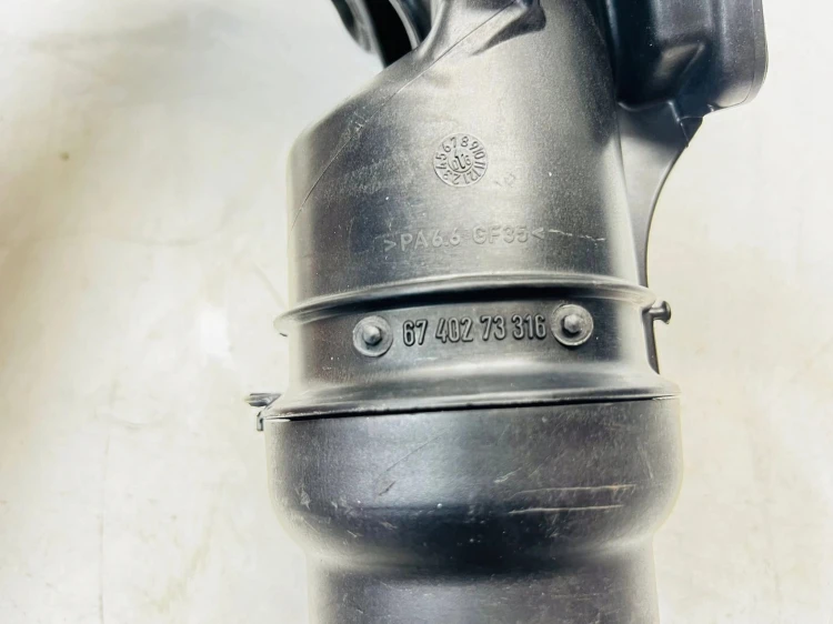 OBUDOWA FILTRA OLEJU AUDI 2.0 TFSI 06F115397F