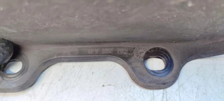 SPOILER PODWOZIA WNĘKI KOŁA AUDI A6 C6 4F9802103