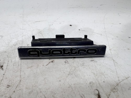 ZNACZEK EMBLEMAT QUATTRO Z GRILLA AUDI A6 C7 4G0853736