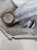 ZAWIAS MASKI LEWY AUDI A1 8X 8X0823301A