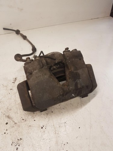 ZACISK HAMULCOWY LEWY PRZÓD AUDI A6 C7 A7 4G0105AK