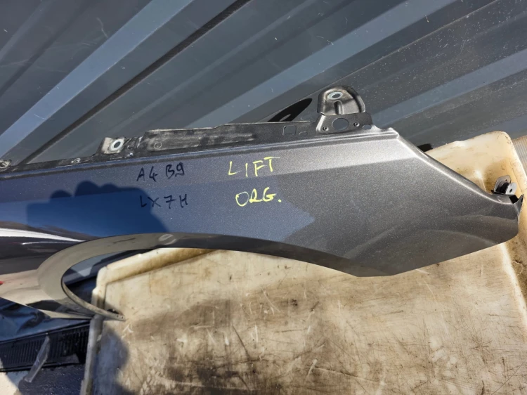 BŁOTNIK PRAWY PRZÓD AUDI A4 B9 LIFT LX7H ORYGINAŁ !!!