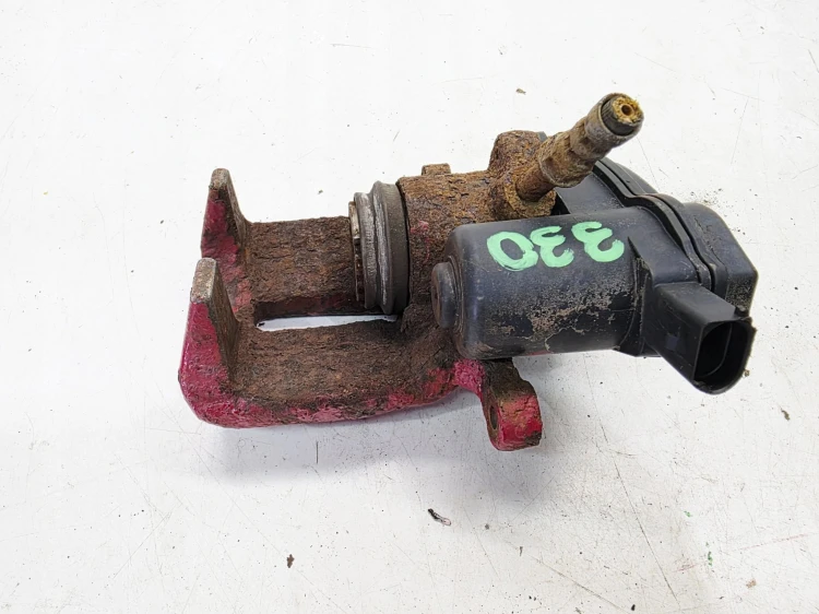 ZACISK HAMULCOWY ELEKTRYCZNY PRAWY TYŁ AUDI A6 C7 POD TARCZĘ 330MM