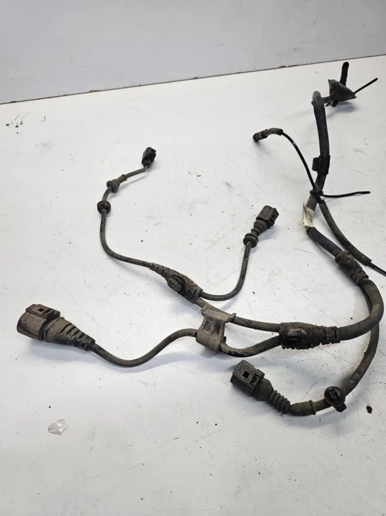WIĄZKA ZACISKU LEWY TYŁ AUDI A6 C6 4F0972253AF