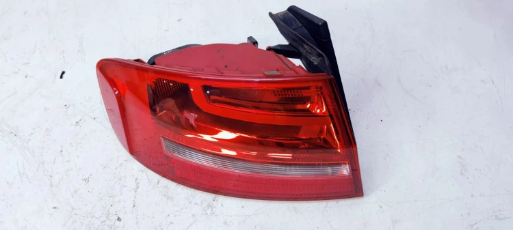 LAMPA LEWY TYŁ W BŁOTNIK AUDI A4 B8 LI 8K5945095AA