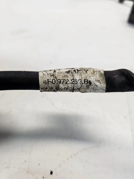 WIĄZKA ZACISKU LEWY TYŁ AUDI A6 C6 4F0972253B