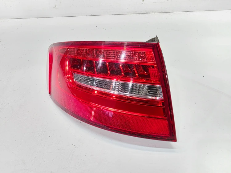 LAMPA LEWY TYŁ LED W BŁOTNIK AUDI A4 B8 LIFT AVANT 8K9945095D