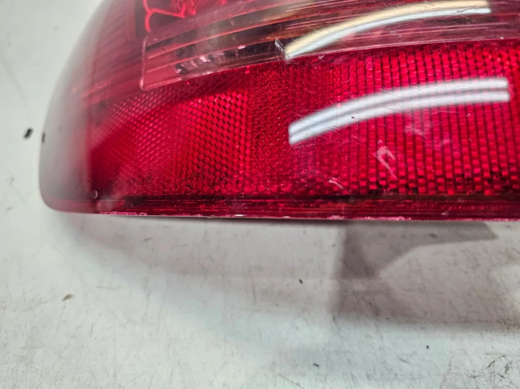 LAMPA LEWY TYŁ W BŁOTNIK LED AUDI A6 C6 4F9945095B ORYGINAŁ