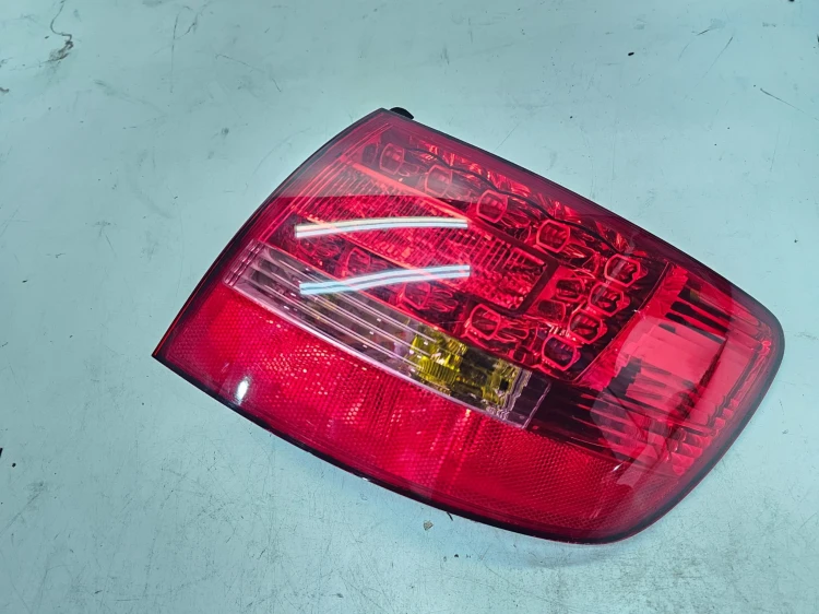 LAMPA PRAWY TYŁ W BŁOTNIK LED AUDI A6 C6 4F9945096B ORYGINAŁ