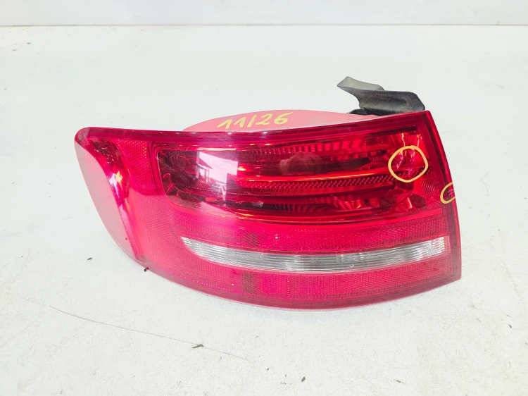 LAMPA LEWY TYŁ W BŁOTNIK NA ŻARÓWKI AUDI A4 B8 AVANT 8K9945095 11/26