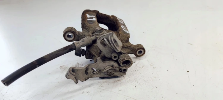ZACISK HAMULCOWY LEWY TYŁ VW SEAT SKODA W08470