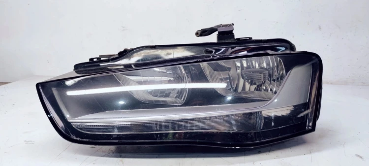 REFLEKTOR LEWY AUDI A4 B8 LIFT UK 8K0941003M