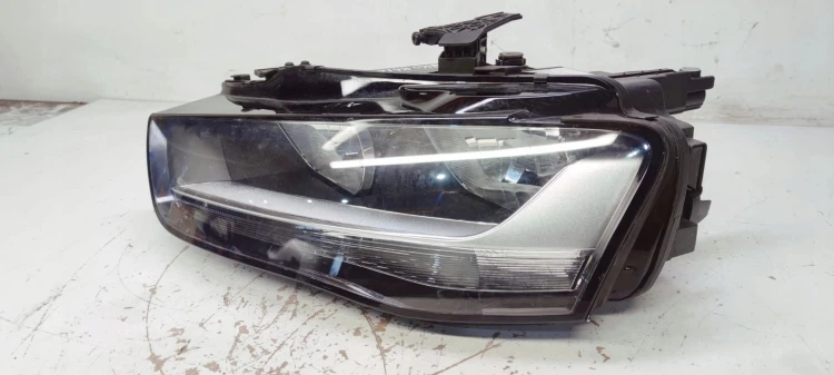 REFLEKTOR LEWY AUDI A4 B8 LIFT UK 8K0941003M BDB