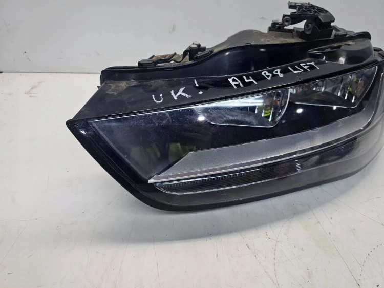 REFLEKTOR LEWY AUDI A4 B8 LIFT UK 8K0941003M