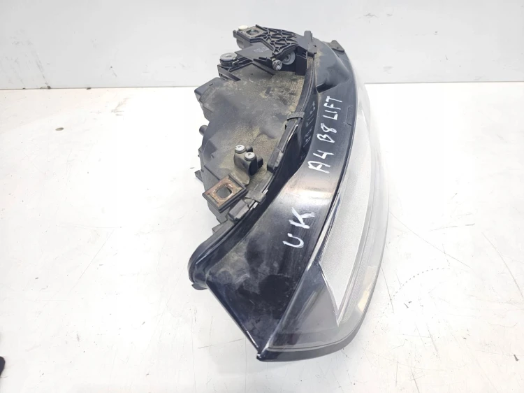 REFLEKTOR LEWY AUDI A4 B8 LIFT UK 8K0941003M