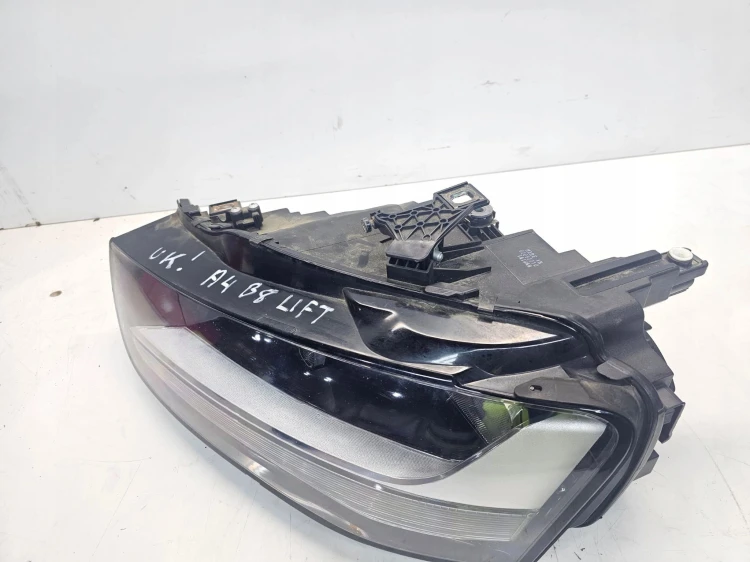REFLEKTOR LEWY AUDI A4 B8 LIFT UK 8K0941003M