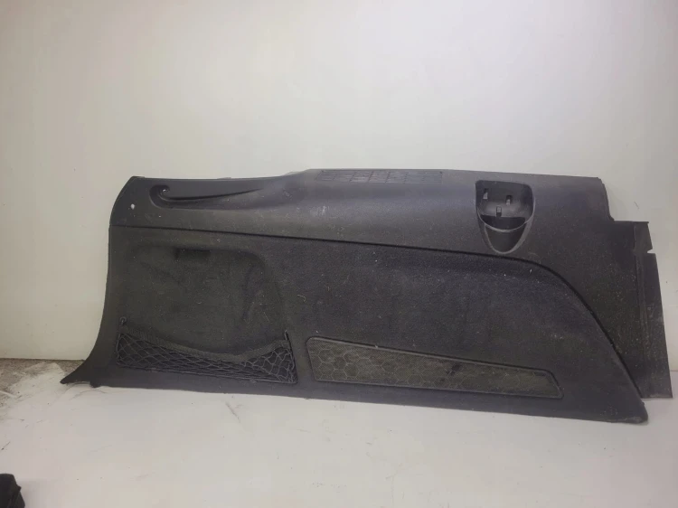 BOCZEK BAGAŻNIKA LEWY AUDI Q7 4L 4L0863879Q